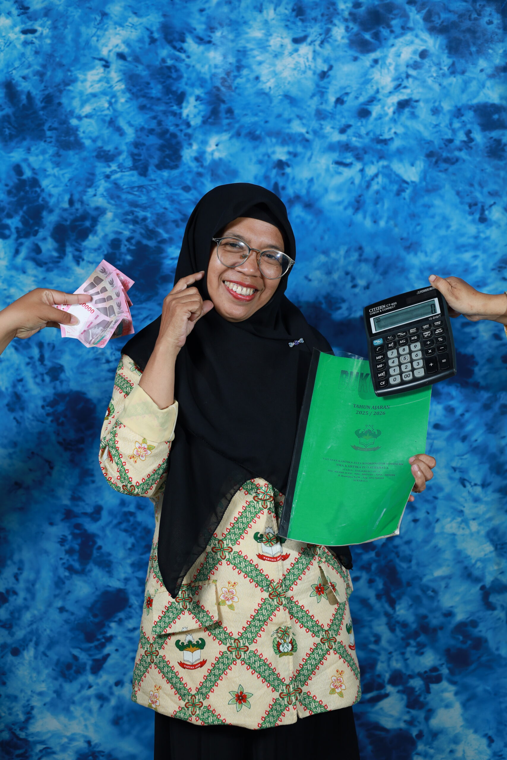 Hj. Nur Achadia, A.Md
